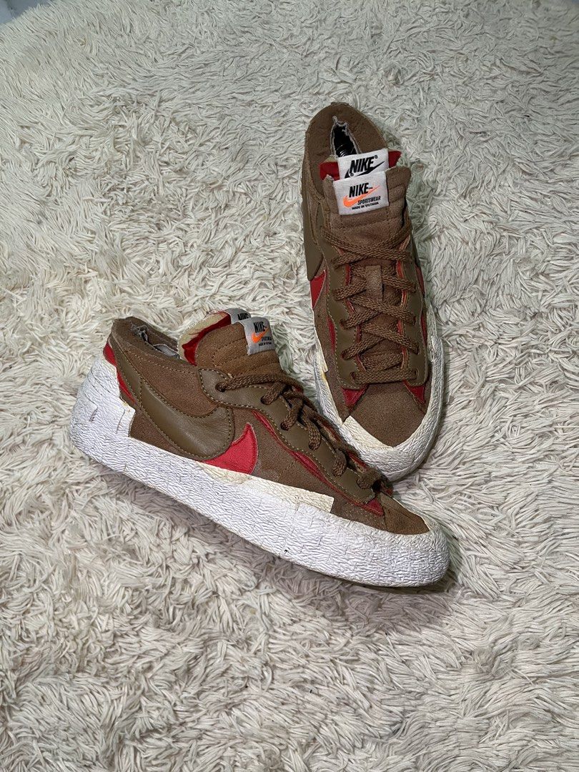 Nike Sacai Blazer Low Brown Red (Category: Sneakers) located in Manila. Submitted by giormagne (Listing ID 1447466194, Image 1). Description: - Nike Sacai Blazer Low sneakers - Color: Brown and Red - Upper material: Suede and Leather - Features a unique layered sole design - Brown laces - Nike and Sacai branding on the tongue - Perfect for casual styling.