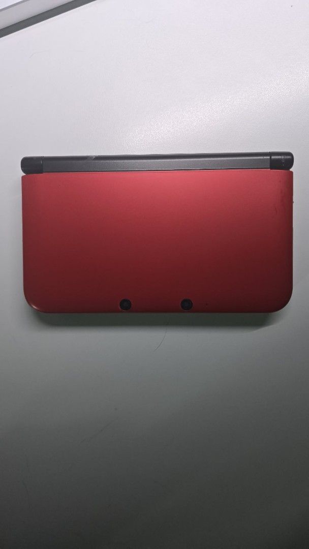 Nintendo 3DS XL Red (Category: Nintendo) located in Manila. Submitted by sean.done (Listing ID 1447326673, Image 1). Description: - Red Nintendo 3DS XL - Features a top screen display and a bottom touchscreen - Includes standard buttons and joystick - Ideal for gaming on the go - Comes with a charger - Jailbroken - With stylus.