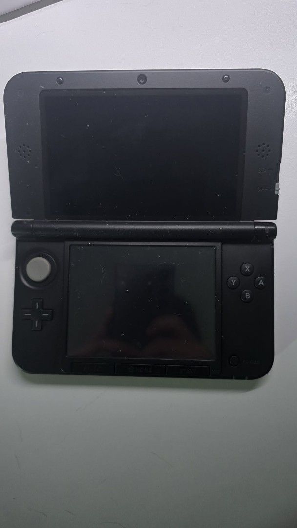 Nintendo 3DS XL Red (Category: Nintendo) located in Manila. Submitted by sean.done (Listing ID 1447326673, Image 3). Description: - Red Nintendo 3DS XL - Features a top screen display and a bottom touchscreen - Includes standard buttons and joystick - Ideal for gaming on the go - Comes with a charger - Jailbroken - With stylus.