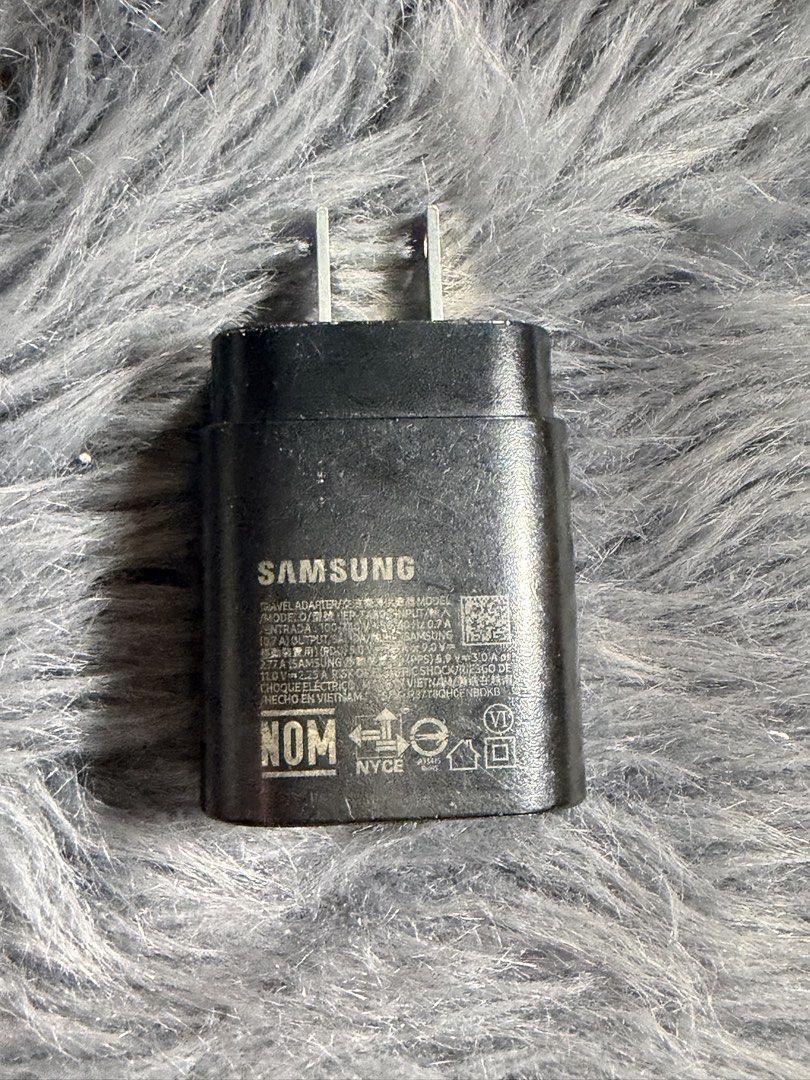Original Samsung Charger Adaptor (Category: Chargers & Cables) located in Quezon City. Submitted by angelannedc (Listing ID 1447320327, Image 1). Description: Original Samsung Adaptor 25W With Box 6months old Bought in Samsung Store Original Price: ₱1,499 It has a few scratches (See in the picture) RFS: Bought 45W.
