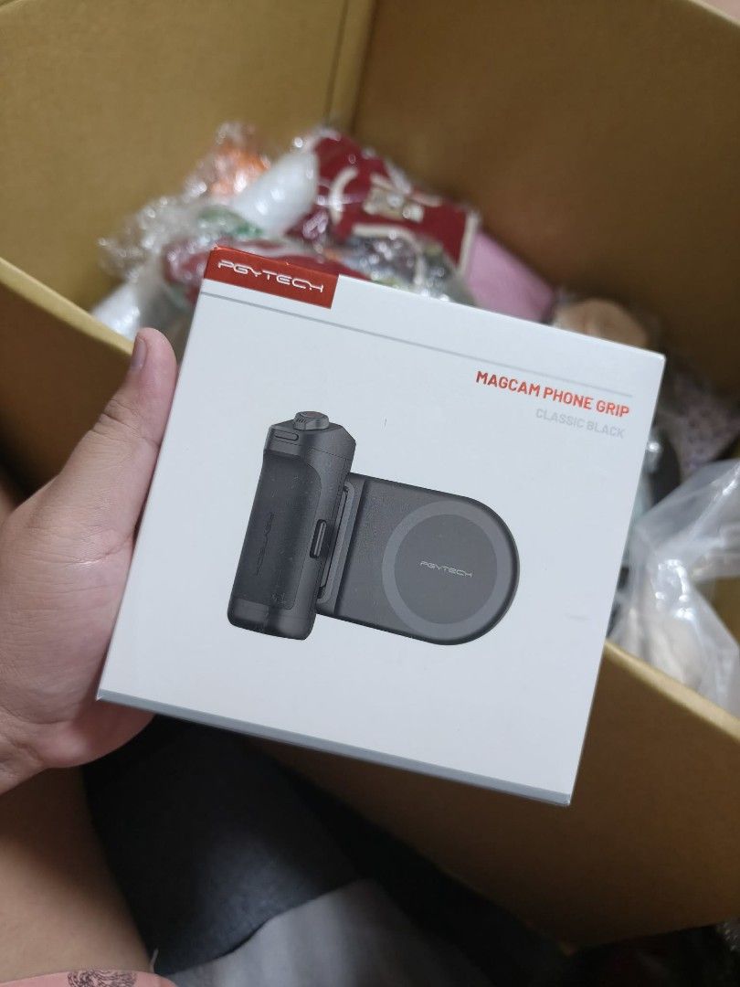PGYTECH Magcam Phone Grip Classic Black (Category: Mounts & Holders) located in Las Pinas. Submitted by micahannebatas-77317 (Listing ID 1447338019, Image 1). Description: - PGYTECH Magcam Phone Grip in Classic Black - Magnetic phone grip with wireless charging capability - Includes grip and charging base - Enhances phone shot stability - Keeps your phone powered up - Simple to attach and use.