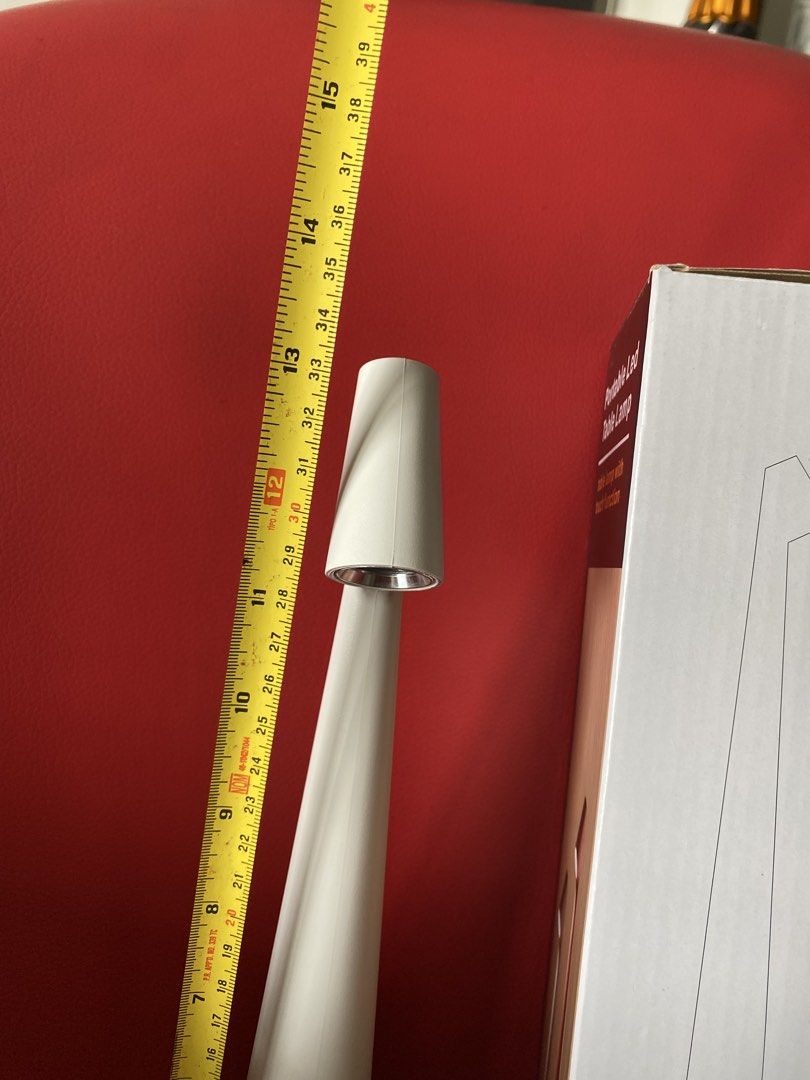 LED Table Lamp with Touch Function (Category: Lighting) located in Singapore. Submitted by msgj_mum (Listing ID 1447307350, Image 3). Description: - Sleek sand white conical LED table lamp - Intuitive touch control for brightness - 3 adjustable intensity levels: - 20 hours (lowest brightness) - 10 hours (medium brightness) - 6.5 hours (highest brightness) - Convenient USB rechargeable battery - Modern design, ideal for desks or bedside tables - O