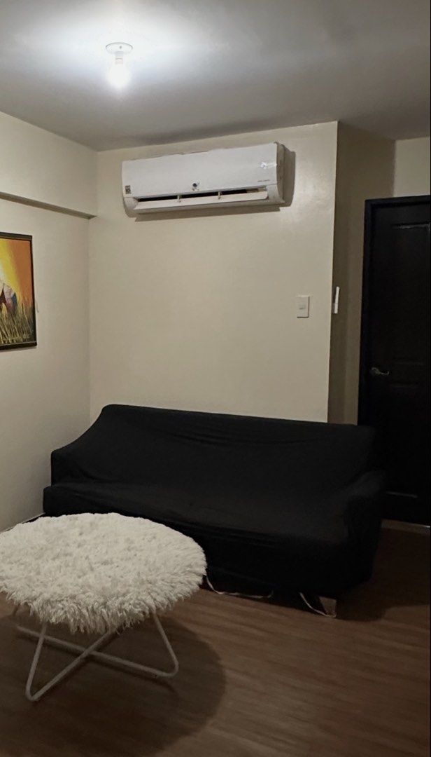 Preloved 3 Seater Sofa (Category: Sofas) located in Las Pinas. Submitted by thestylecapital (Listing ID 1447315128, Image 1). Description: Preloved 3-Seater Sofa 🛋️ ✔️ Comes with a black sofa cover The sofa is still sturdy and in good condition overall. The foam remains firm and comfortable. Please note that the original fabric underneath the sofa cover has some stains, so it may need professional cleaning or reupholstering if you plan to use it