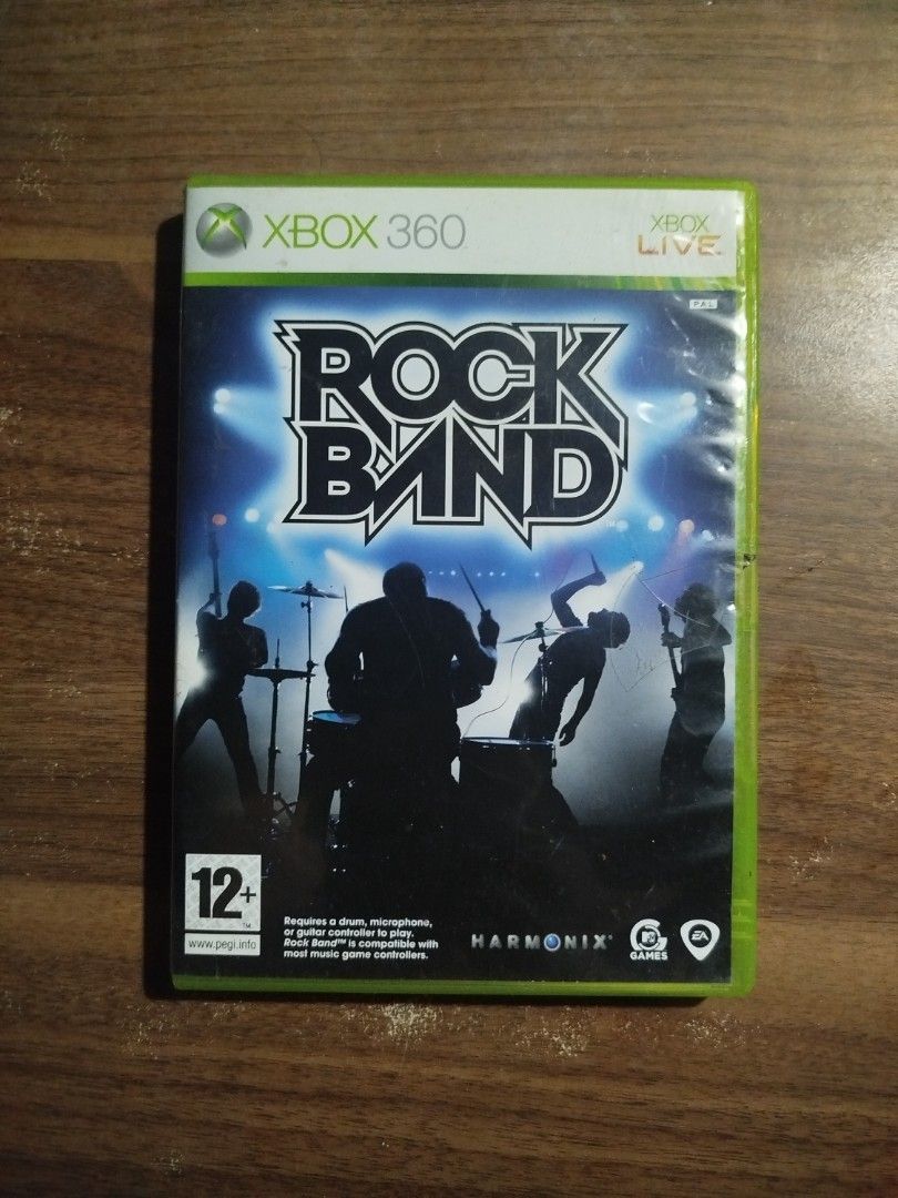 Rock Band Xbox 360 Game (Category: Xbox) located in Binan City. Submitted by pumpkiiin02 (Listing ID 1447373957, Image 1). Description: - Rock Band game for Xbox 360 - Features dozens of classic songs by original artists - Play solo or form a band with friends - Ideal for parties and gatherings - Live out your rock and roll fantasy!.