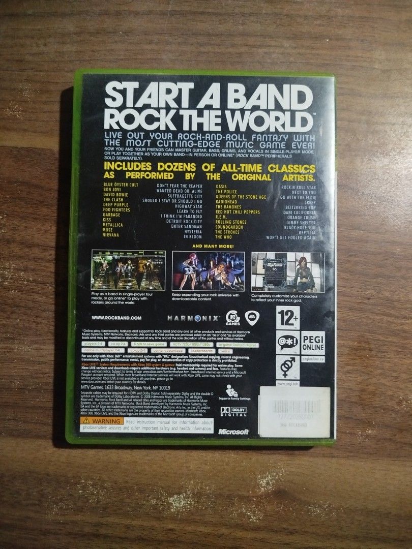 Rock Band Xbox 360 Game (Category: Xbox) located in Binan City. Submitted by pumpkiiin02 (Listing ID 1447373957, Image 2). Description: - Rock Band game for Xbox 360 - Features dozens of classic songs by original artists - Play solo or form a band with friends - Ideal for parties and gatherings - Live out your rock and roll fantasy!.