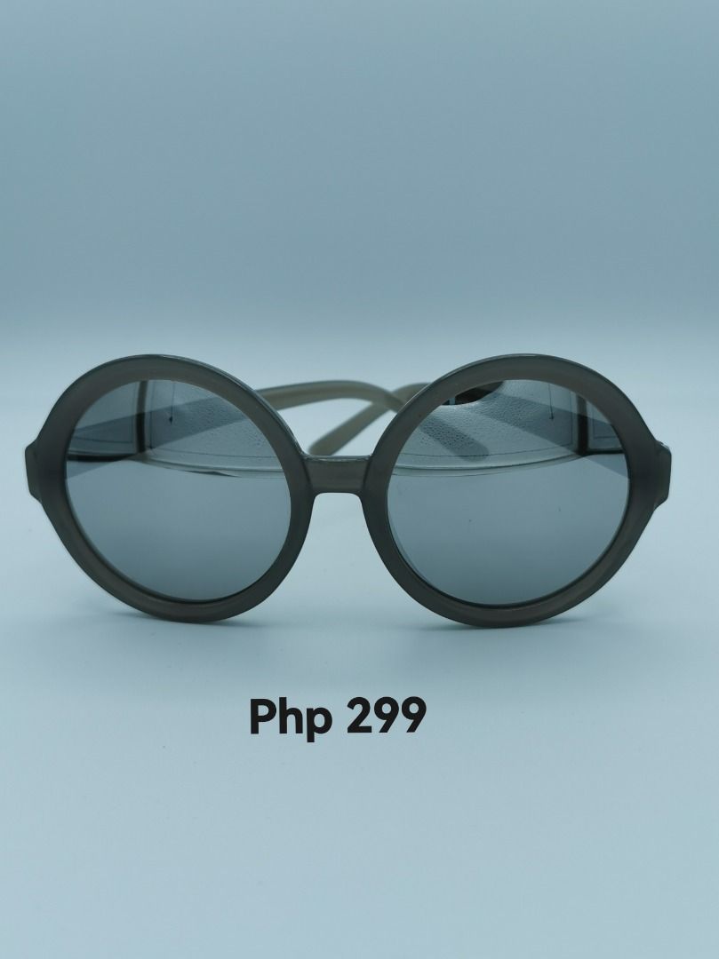 Round Grey Sunglasses with Mirrored Lenses (Category: Sunglasses & Eyewear) located in Malabon City. Submitted by restrapped88 (Listing ID 1447391188, Image 1). Description: - In good condition - Stylish round sunglasses - Grey frames - Ideal for sunny weather.