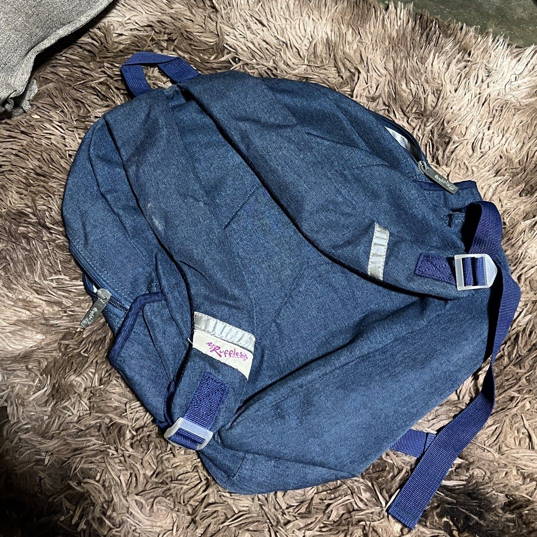 Ruffles Backpack (Category: Backpacks) located in Cavite. Submitted by micole. (Listing ID 1447462629, Image 2). Description: - 8/10 condition - pwede for kids - signs of usage - may stains but matatanggal naman po pag winash. - may sirang zipper (kita sa pic) - also may konting rust sa bottom part na bakal RFS: Decluttering .