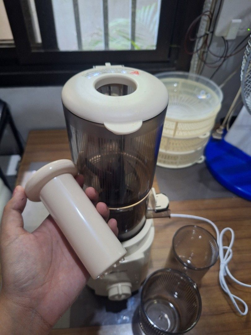 Simplus Juicer with Cups and Pusher (Category: Juicers, Blenders & Grinders) located in Bulacan. Submitted by AshinaKits (Listing ID 1447335370, Image 3). Description: FOR SALE RUSH SIMPLUS JUICER bagong bago binuksan lang. 1.2L Capacity 250ml Juice Collector Capacity 99.8% Juice Purity 113mm Extra wide Feed Chute - Simplus Juicer - Includes 2 cups and pusher - Easy to use with rotating dial settings - Compact design, ideal for small kitchens - S