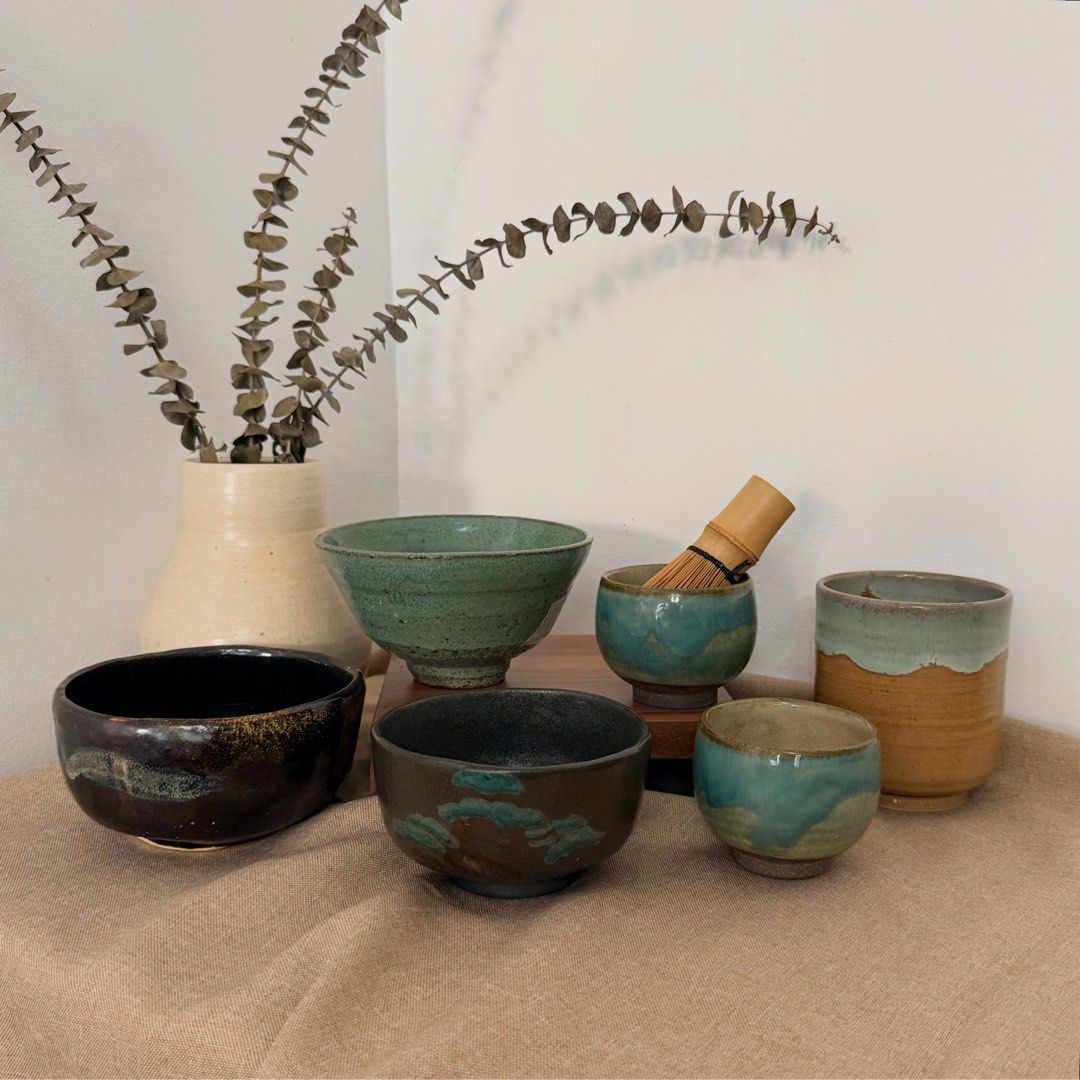 Stoneware Chawan and Cups (Category: Coffee & Tea Tableware) located in General Trias. Submitted by curated.stoneware.ph. (Listing ID 1447466893, Image 1). Description: COASTAL EARTH A•5x3 - ₱395 B•5.5x3 - ₱395 C•SOLD D•3x2.5 - Set of 2 - ₱155 (Ideal for soaking your whisk • Has signs of usage) E•3.5x4.25 - ₱245 A collection of earthy stoneware finished in ocean-inspired glazes—deep teal, muted sage, and warm clay tones. Beautiful for matcha ritu