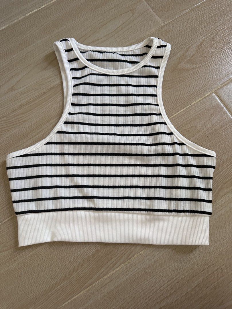 Striped Ribbed Racerback Crop Top (Category: Sleeveless) located in Antipolo. Submitted by waco1313 (Listing ID 1447301167, Image 1). Description: - Black and white striped ribbed crop top - Racerback style with a white band at the bottom - Stretchy and comfortable material - Perfect for casual wear or layering.