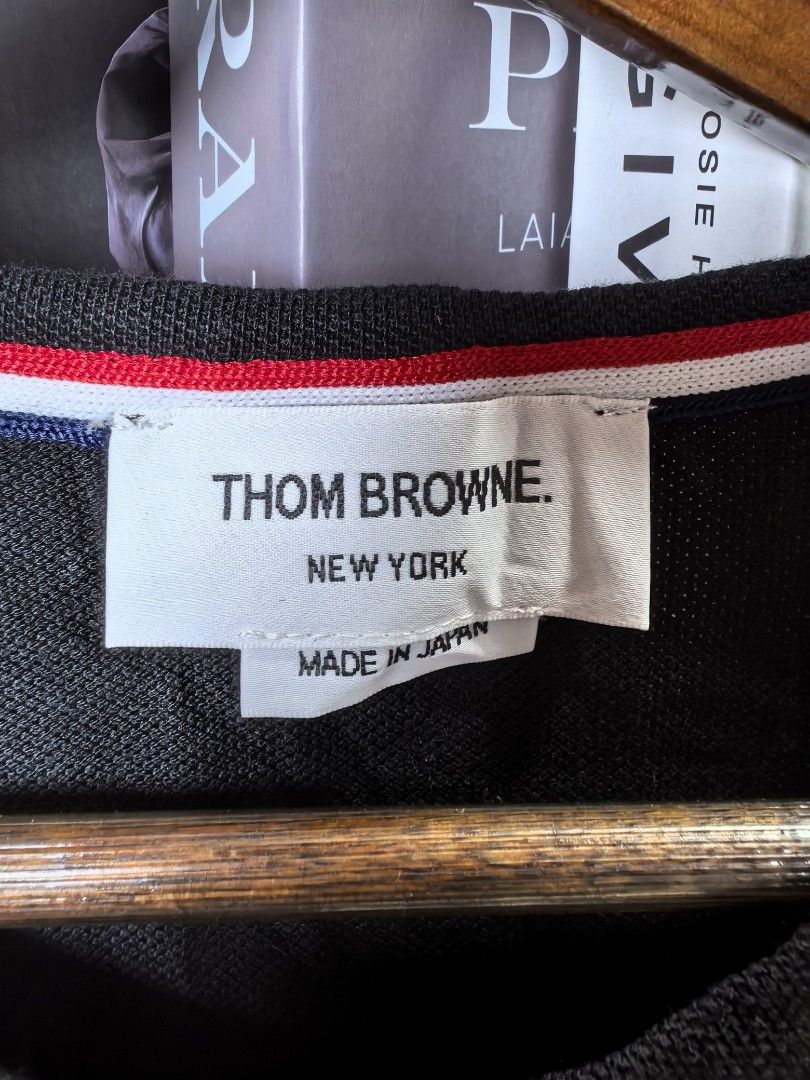 Thom Browne tshirt (Category: Luxury Apparel) located in Baguio. Submitted by ashzachary (Listing ID 1447427010, Image 2). Description: Thom Browne tshirt Condition :Excellent condition Color rate 10/10 Size : Medium Inches:W19/L28. 5 No issues No flaws Super ganda sa personal Pm. More details Good quality Plsss 📌No Bogus 📌No return MOP What you see is what you get PALAWAN, CEBUNA GCASH AND BDO Reminder😊 We're selling thrifted clothes so pleas