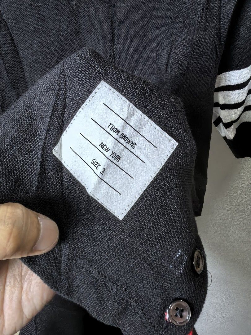 Thom Browne tshirt (Category: Luxury Apparel) located in Baguio. Submitted by ashzachary (Listing ID 1447427010, Image 3). Description: Thom Browne tshirt Condition :Excellent condition Color rate 10/10 Size : Medium Inches:W19/L28. 5 No issues No flaws Super ganda sa personal Pm. More details Good quality Plsss 📌No Bogus 📌No return MOP What you see is what you get PALAWAN, CEBUNA GCASH AND BDO Reminder😊 We're selling thrifted clothes so pleas