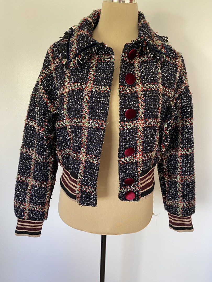 Tweed Plaid Bomber Jacket with Velvet Buttons (Category: Coats, Jackets and Outerwear) located in Santa Rosa. Submitted by summerbrunch (Listing ID 1447469629, Image 1). Description: BUY WORTH 1K, GET FREE SHIPPING! EXCEPT FOR STROLLER BAG Mannequin Size: MEDIUM has 2 side pockets all buttons working full inner lining - Navy blue tweed bomber jacket - Plaid pattern with red, green, and white threads - Velvet buttons down the front - Ribbed cuffs 
