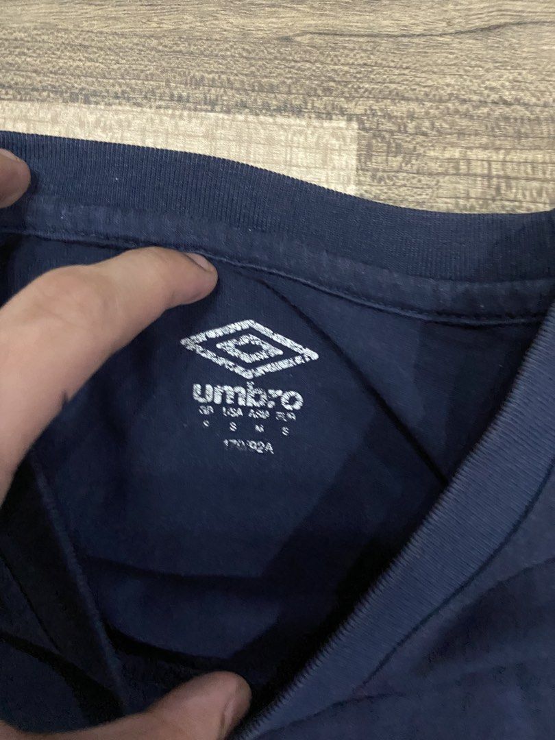 Umbro Navy Blue T-shirt (Category: Tshirts & Polo Shirts ) located in Quezon City. Submitted by pel.plug (Listing ID 1447303508, Image 3). Description: Umbro 19X27 color rate: 8/10 need wash dm for more details unli vc.