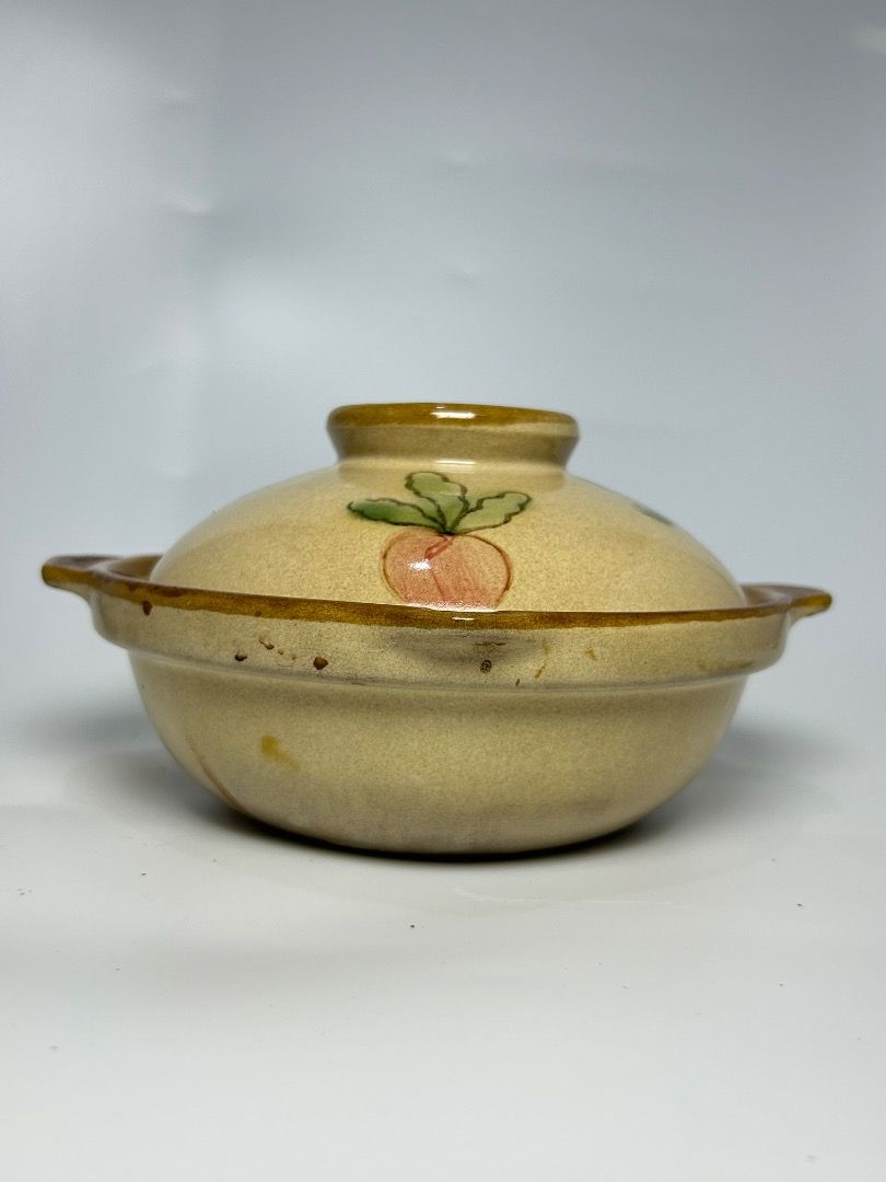 Vintage Ceramic Casserole Dish with Lid - Vegetable Design (Category: Cookware & Accessories) located in Taguig. Submitted by Rare_findsmnl (Listing ID 1447467509, Image 1). Description: Clay pot with Spout. ₱500 8.5” including the handle 7.5” w/o the handle H:5” NOTE: Selling low With hair line - Adorable ceramic casserole dish with lid. - Features a charming hand-painted vegetable design on the lid. - Equipped with two convenient handles for ea
