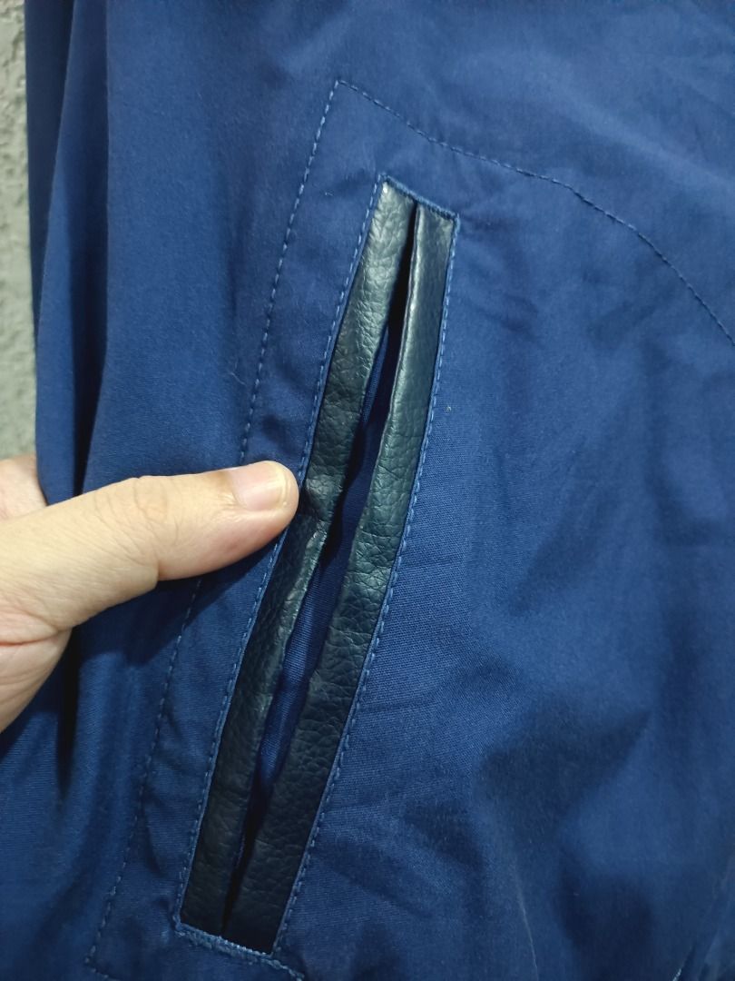 (PRICE DROP) - VINTAGE EVISU HIGH-COLLAR BOMBER JACKET (Category: Coats, Jackets and Outerwear) located in Calamba. Submitted by rootsph (Listing ID 1447450836, Image 3). Description: Details: Fits Large. Leather on the collar, ribbings, and pockets. Has a secret pocket at the back right side. Dimes: 22W x 27L Color: Blue Condition: Excellent, no issue, complete tags Please manage your expectation, item being sold is preloved and not brand new un