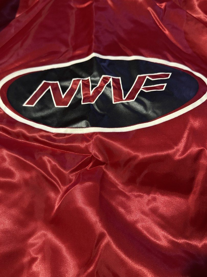 Vintage Howe Athletic Apparel Red WWF Satin Bomber Jacket (Category: Coats, Jackets and Outerwear) located in Manila. Submitted by _ravenqueen (Listing ID 1447301463, Image 3). Description: - Classic red satin bomber jacket - Features iconic WWF logo on the back - Ribbed cuffs and collar with stylish stripe details - Easy button-up front closure - Ideal for wrestling enthusiasts - Great for layering during cooler weather - S on Tag.