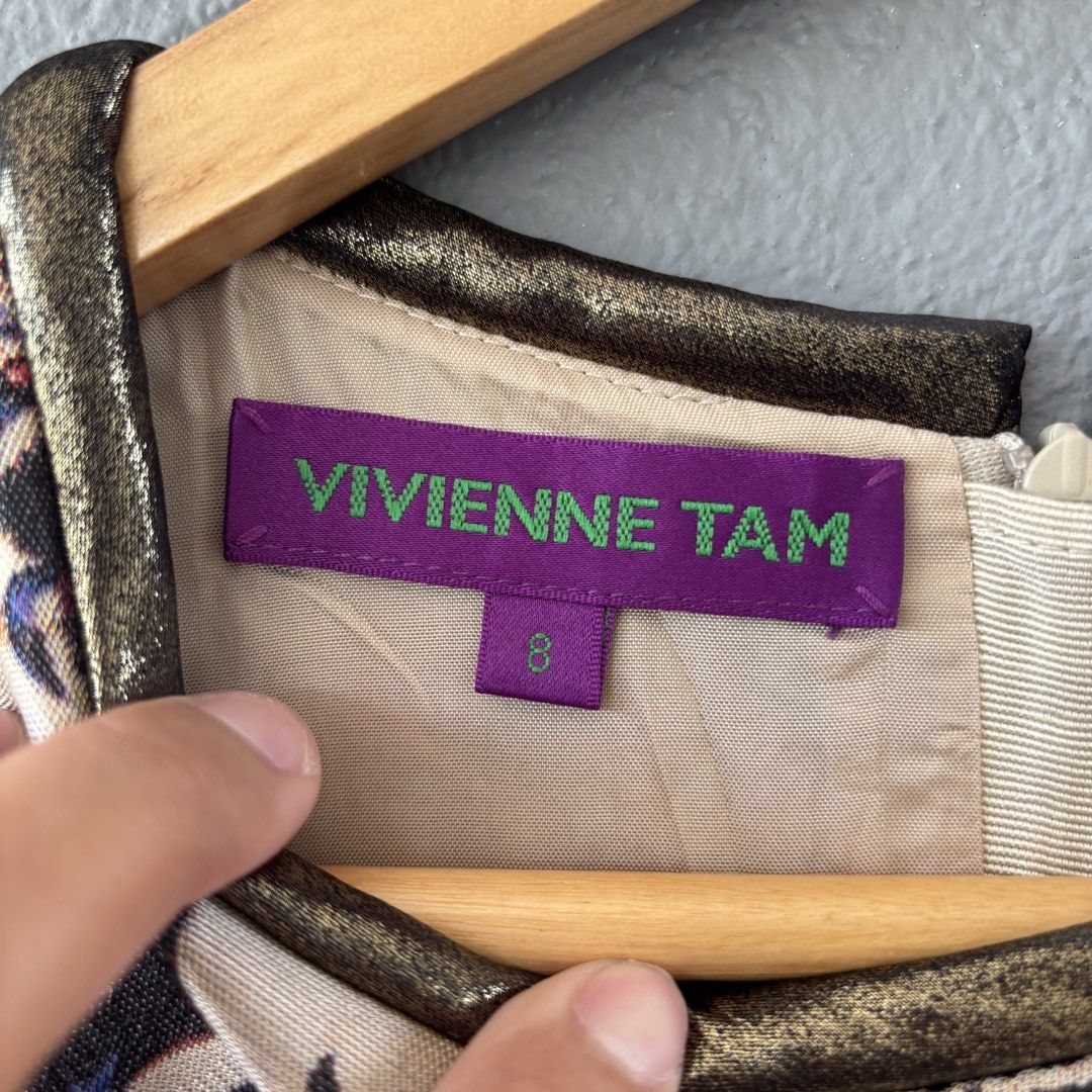 vivienne tam (Category: Blouses) located in San Fernando. Submitted by diff.thr1ft (Listing ID 1447308406, Image 3). Description: - Brand: Vivienne Tam - Type: Blouse - Size: M (US 6 / UK 10 / EU 38) - Design: Eye-catching abstract/artistic print - Condition: Good (Condition 4) - Features: Unique neckline detail - Meet-up available in San Fernando, Pampanga.