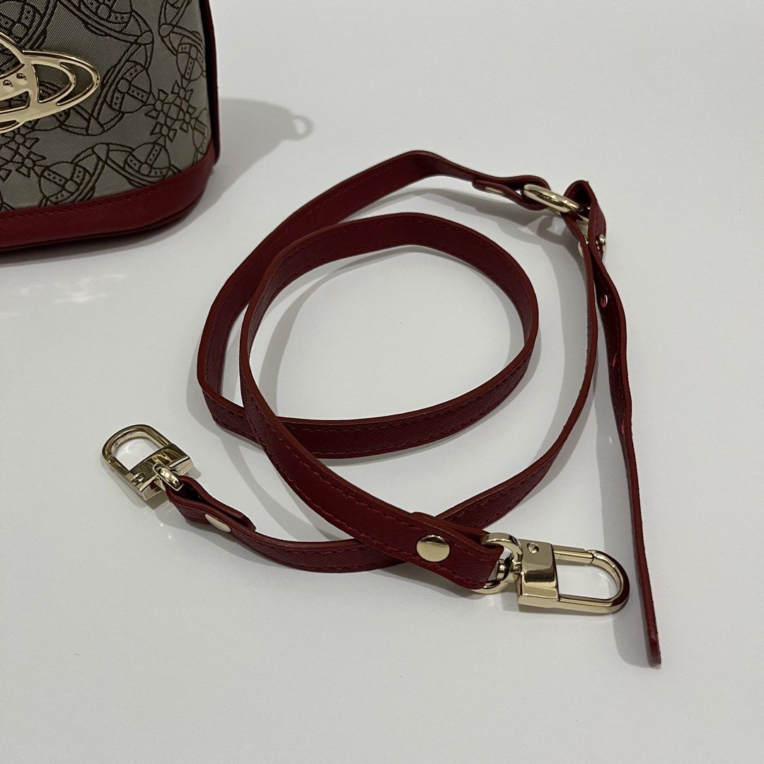 VIVIENNE WESTWOOD - DAISY SMALL DRAWSTRING BUCKET BAG (Category: Luxury Bags & Wallets) located in Lucena. Submitted by southsidekartell (Listing ID 1447410097, Image 3). Description: IN GREAT CONDITION NO MAJOR ISSUES VIVIENNE WESTWOOD VEGAN .