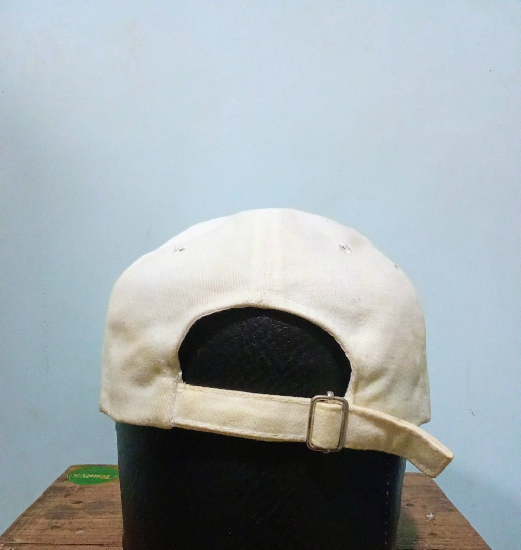 White Cap "Most Likely To Not Give A Fuck" (Category: Caps & Hats) located in Pagsanjan. Submitted by tomsupply (Listing ID 1447359421, Image 3). Description: - Classic white baseball cap - Embroidered text on front: "MOST LIKELY TO NOT GIVE A FUCK" - Adjustable strap for a comfortable fit - Perfect for casual everyday wear.