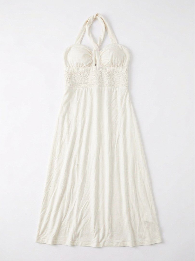 White Halter Neck Ruched Y2K dress (Category: Dresses) located in San Jose del Monte. Submitted by declothering_ph (Listing ID 1447391107, Image 2). Description: - Cream colored halter neck dress - Ruched bodice - Flowy skirt - Smocked back for a comfortable fit - Made in USA - Ideal for beach vacations or summer parties.