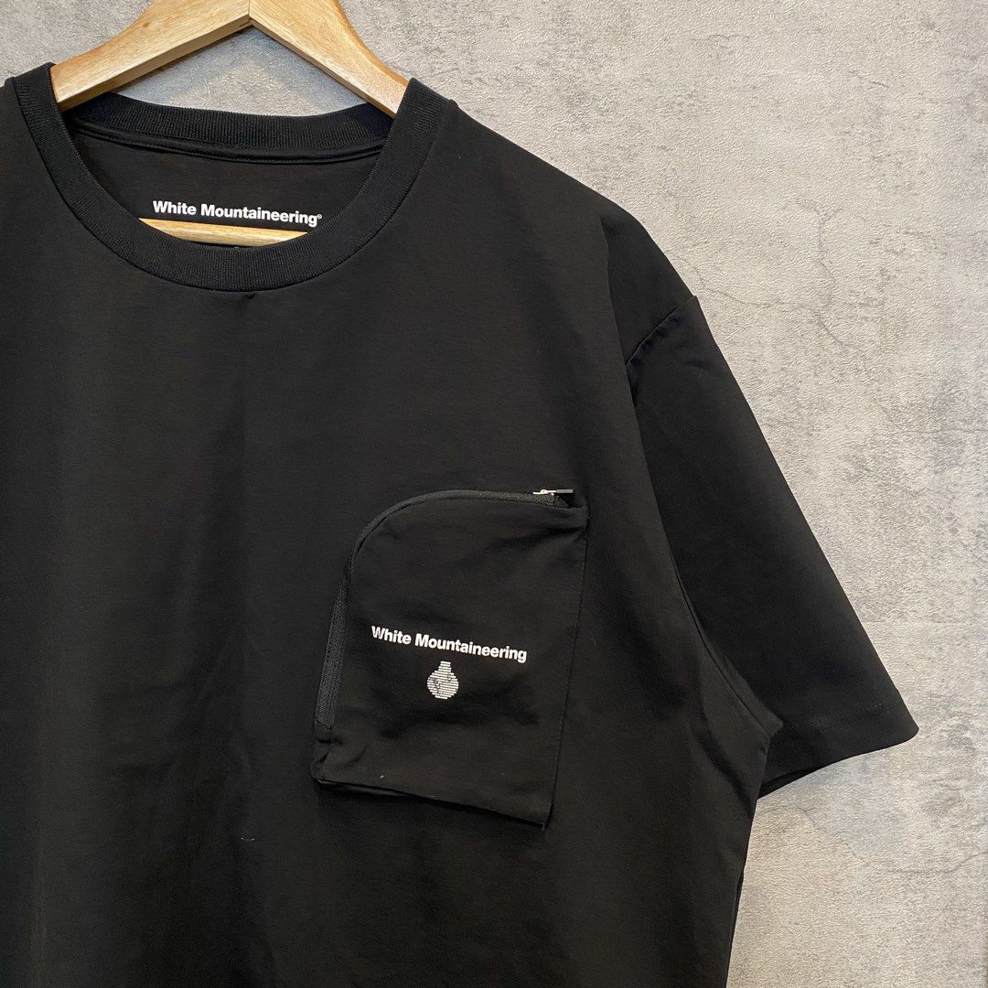 White Mountaineering Pocket Shirt (Category: Tshirts & Polo Shirts ) located in Quezon City. Submitted by rebirthalley (Listing ID 1447409688, Image 2). Description: Width-24 Length-30 Sleeve-10 Shoulder-20 Hem-24.5 Excellent Condition No flaws 1580.
