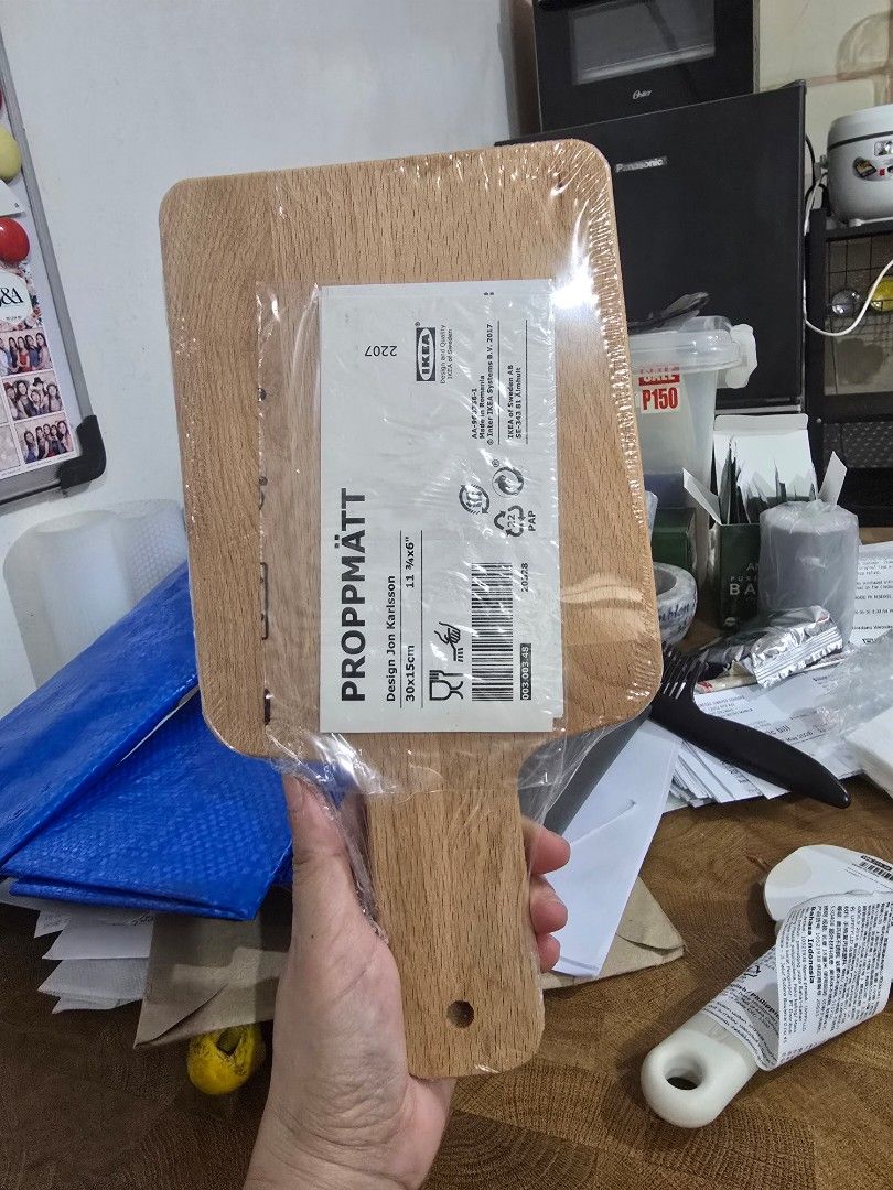 Wooden Cutting Board (Category: Knives & Chopping Boards) located in Makati City. Submitted by shopaholicsgallery (Listing ID 1447298936, Image 1). Description: - IKEA small wooden cutting board - Perfect for chopping fruits or serving cheese and crackers - Made of durable wood - Includes a hole for convenient hanging - Easy to clean and store - Compact size, ideal for small kitchens.