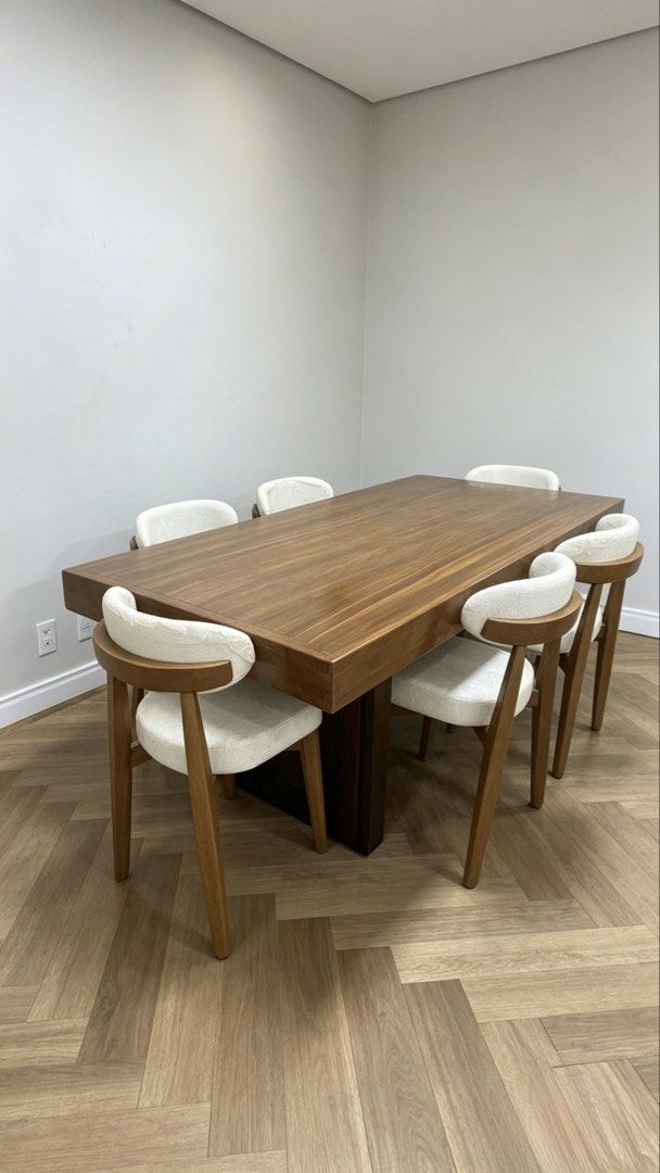 Wooden Dining Table with 6 Chairs (Category: Tables & Sets) located in Manila. Submitted by shuri_19 (Listing ID 1447371010, Image 3). Description: - Modern solid wood dining table - Includes 6 comfortable upholstered chairs - Chairs feature wooden frames and white cushions - Seats up to 6 people - Ideal for family meals and entertaining - Selling as a complete set.