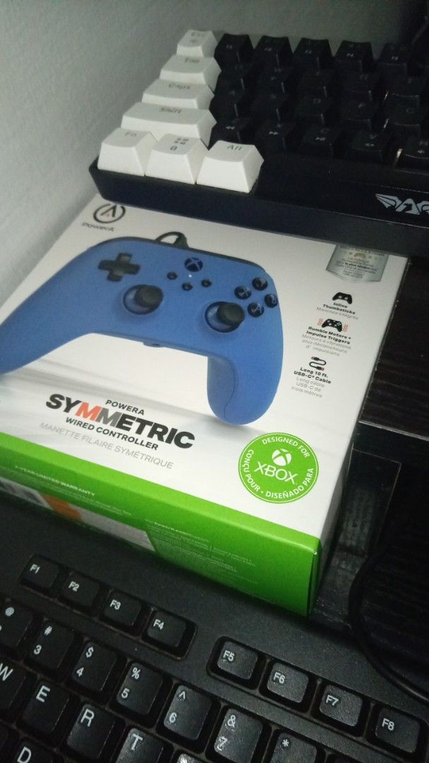 Xbox controller (Category: Controllers) located in Singapore. Submitted by uroemkia (Listing ID 1447465098, Image 2). Description: Used blue PowerA wired controller for Xbox. USB connection. Works well. Comes in original box. Cash .