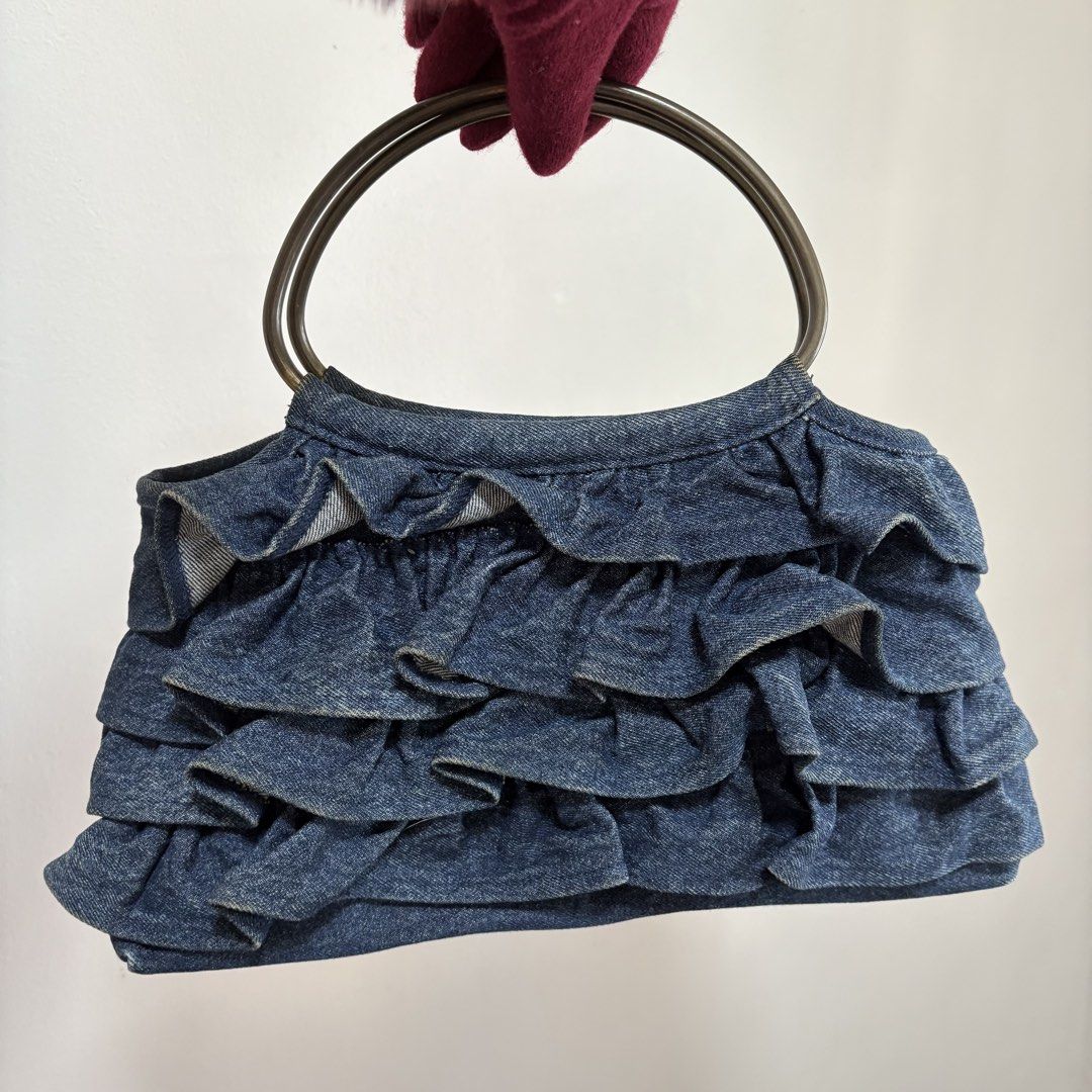Y2K DENIM RUFFLED HANDBAG METAL HANDLE (Category: Clutches) located in Cainta. Submitted by prebyihellop (Listing ID 1447365475, Image 1). Description: Good condition Very chic No issue Ready to use .