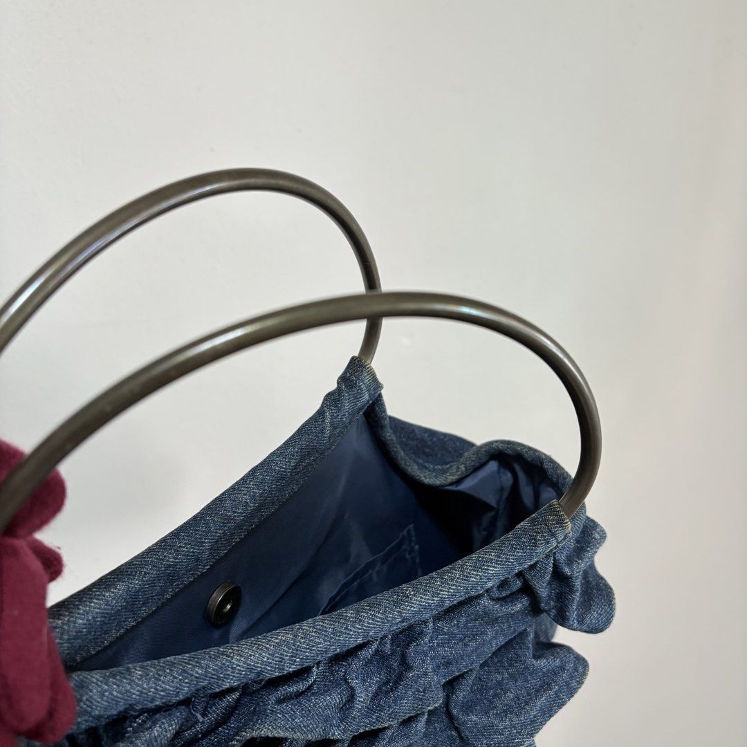 Y2K DENIM RUFFLED HANDBAG METAL HANDLE (Category: Clutches) located in Cainta. Submitted by prebyihellop (Listing ID 1447365475, Image 2). Description: Good condition Very chic No issue Ready to use .