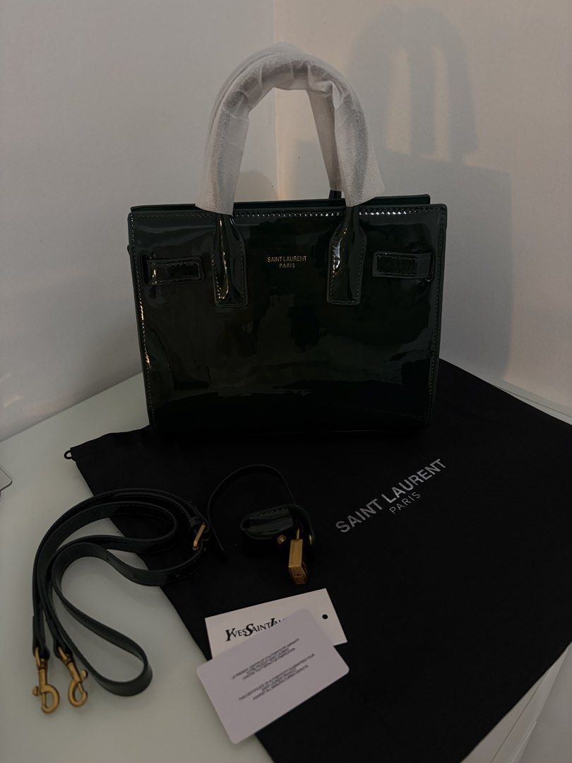 YSL Hand bag (Category: Luxury Bags & Wallets) located in Paranaque City. Submitted by machi99 (Listing ID 1447322575, Image 1). Description: Saint Laurent Sac De Jour Nano in Dark Green Patent Leather - Hand bag/Crossbody bag .