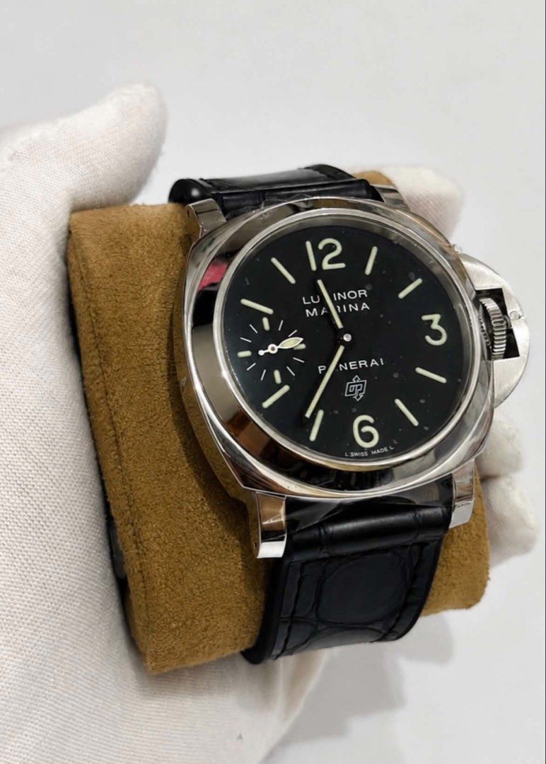 2012 Panerai Luminor Marina Base Model 44mm (Category: Luxury Watches) located in Del Monte. Submitted by arvin_mayo (Listing ID 1452718844, Image 1). Description: Panerai Marina Base Model Reference PAM000 2012 year model, O series 44mm case size Manual winding 9.5/10 excellent condition Watch and pouch only Trades accepted up or down P168,000 only.