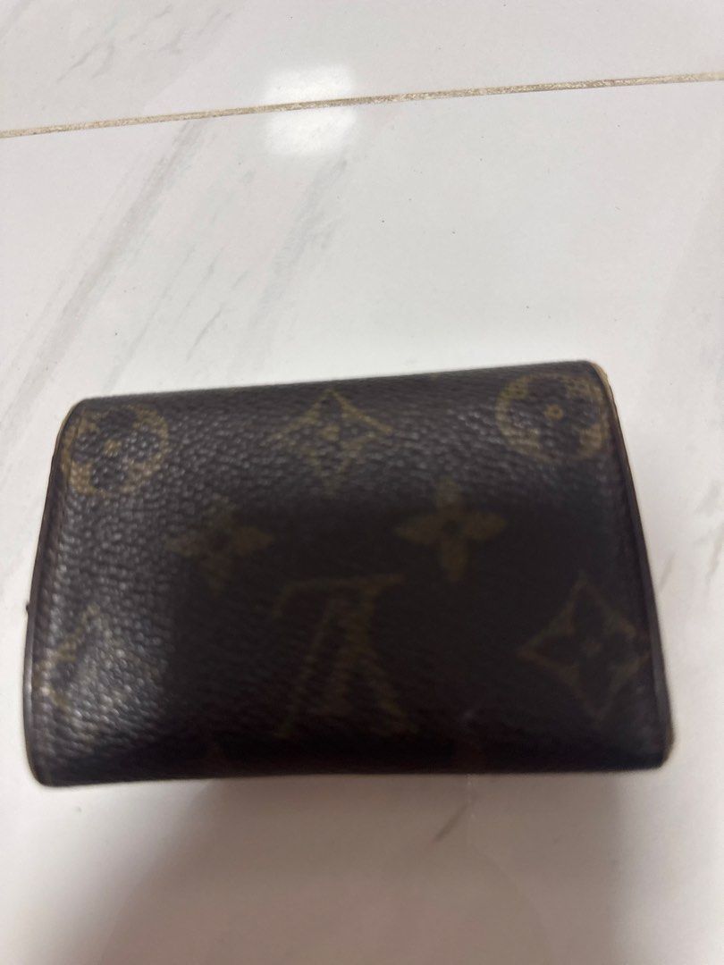2027 Vintage Louis Vuitton Monogram Key Pouch (Category: Luxury Bags & Wallets) located in Silang. Submitted by sari2bilina (Listing ID 1452766088, Image 3). Description: - Authentic Louis Vuitton Key Pouch - Classic Monogram Canvas - Fully functional for holding keys - Approximate Measurements: 4 inches (length) x 2 inches (height) visible na used last pic.