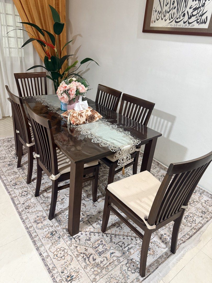 6 Dining Table (Category: Tables & Sets) located in Singapore. Submitted by nurnorfa (Listing ID 1452701290, Image 1). Description: Dining Table is in good condition. Includes 6 matching chairs. One chair had a slightly damaged weak leg, but still usable. Normal signs of wear due to use. Selling as a complete set. Self collection at Bukit Batok. Price Negotiable .