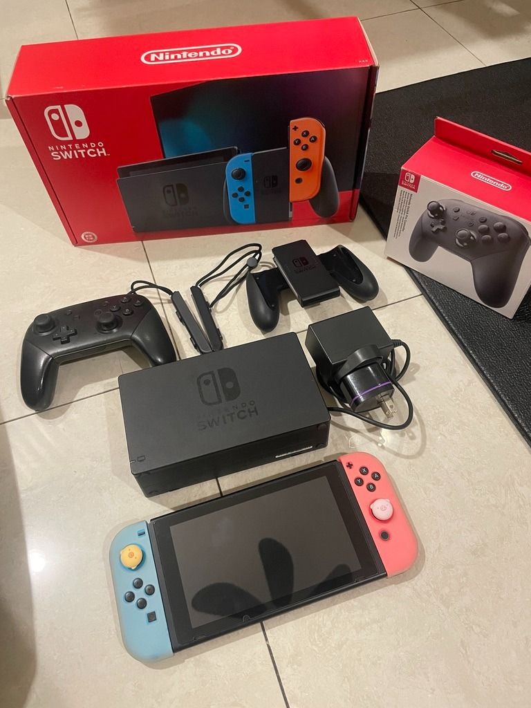 🎮 Nintendo Switch V2 Complete Bundle For Sale (Category: Nintendo) located in Quezon City. Submitted by tiffaniecheung (Listing ID 1452823518, Image 3). Description: Selling my Nintendo Switch V2 (Improved Battery Version) in excellent condition. Adult-owned and well taken care of. Inclusions: ✅ Nintendo Switch V2 Console (HK Unit) ✅ Original Box ✅ Dock ✅ Original Charger ✅ HDMI Cable ✅ Joy-Con Grip & Straps ✅ Original Nintendo Switch Pro Contro