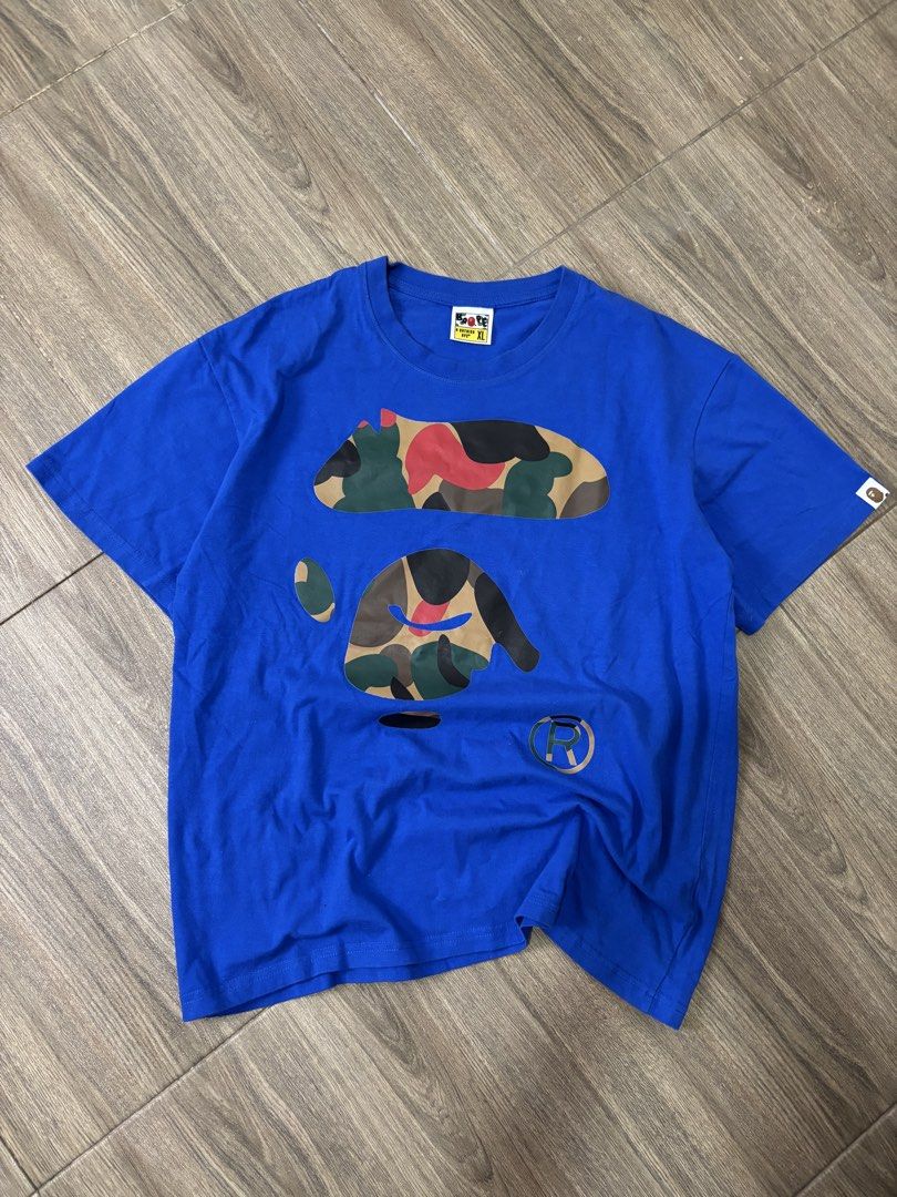 A Bathing Ape (BAPE) Blue Camou Shirt (Category: Tshirts & Polo Shirts ) located in Mandaue City. Submitted by danavelu12 (Listing ID 1452866437, Image 1). Description: A Bathing Ape (BAPE) Blue Camou Shirt Dimensions (in inches) Width: 21.5 x 26 Length Condition: 10 out of 10 As new Issue: None (SWIPE RIGHT TO SEE MORE DETAILS) - CLAIM: 350 (Automatically yours) + shipping fee.