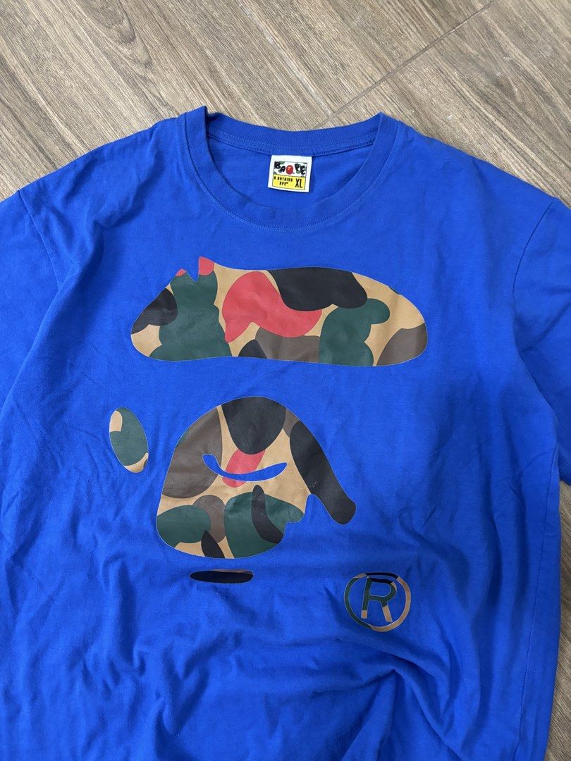 A Bathing Ape (BAPE) Blue Camou Shirt (Category: Tshirts & Polo Shirts ) located in Mandaue City. Submitted by danavelu12 (Listing ID 1452866437, Image 3). Description: A Bathing Ape (BAPE) Blue Camou Shirt Dimensions (in inches) Width: 21.5 x 26 Length Condition: 10 out of 10 As new Issue: None (SWIPE RIGHT TO SEE MORE DETAILS) - CLAIM: 350 (Automatically yours) + shipping fee.