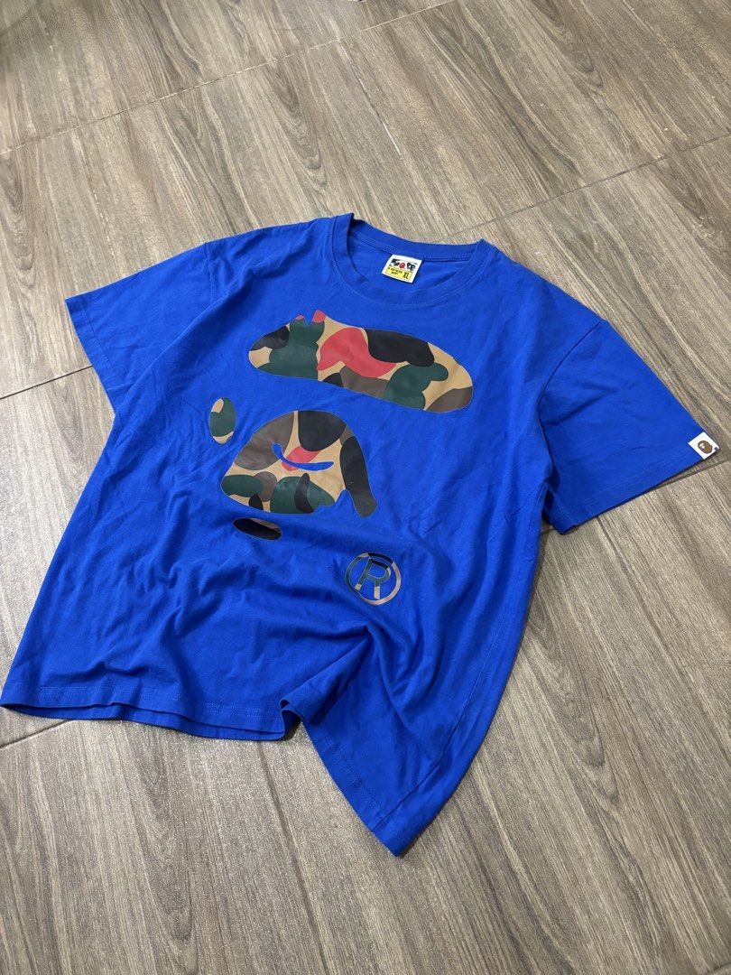 A Bathing Ape (BAPE) Blue Camou Shirt (Category: Tshirts & Polo Shirts ) located in Mandaue City. Submitted by danavelu12 (Listing ID 1452866437, Image 2). Description: A Bathing Ape (BAPE) Blue Camou Shirt Dimensions (in inches) Width: 21.5 x 26 Length Condition: 10 out of 10 As new Issue: None (SWIPE RIGHT TO SEE MORE DETAILS) - CLAIM: 350 (Automatically yours) + shipping fee.