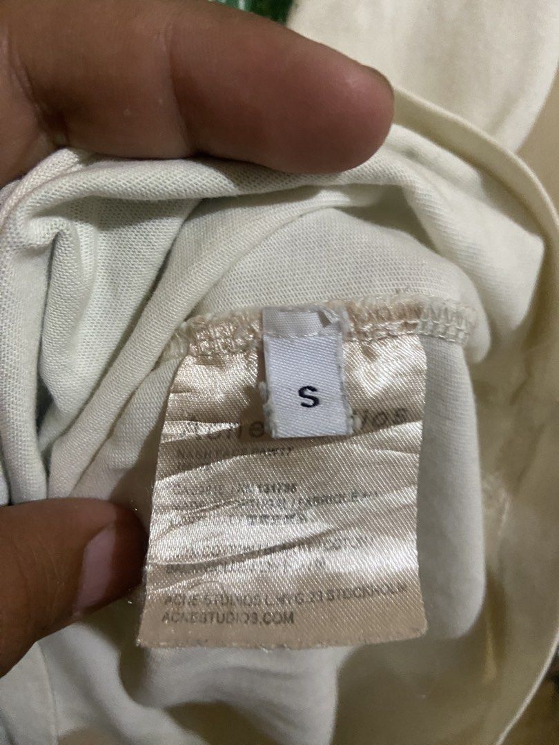Acne Studios Graphic T-Shirt Size S (Category: Tshirts & Polo Shirts ) located in Don Carlos. Submitted by doubleethrifted (Listing ID 1452706857, Image 3). Description: - Brand: Acne Studios - Item: Graphic T-Shirt - Color: Cream/Off-white - Size: S - Design: Forest and bear print - Occasion: Casual wear.