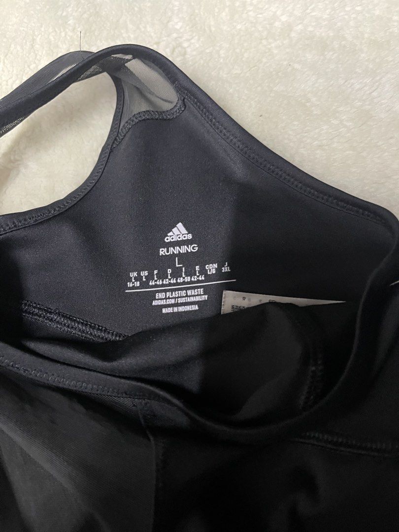 Adidas Black Running Top & Shorts Set Size L (Category: Activewear) located in Baguio. Submitted by randomly2600 (Listing ID 1452813334, Image 3). Description: - Adidas Black Running Set - Size: Large (L) - Crop Top: Features mesh detail and ruffled hem - Shorts: Classic design with signature three stripes - Versatile: Ideal for workouts, running, or casual wear - Sporty & Stylish Combo.