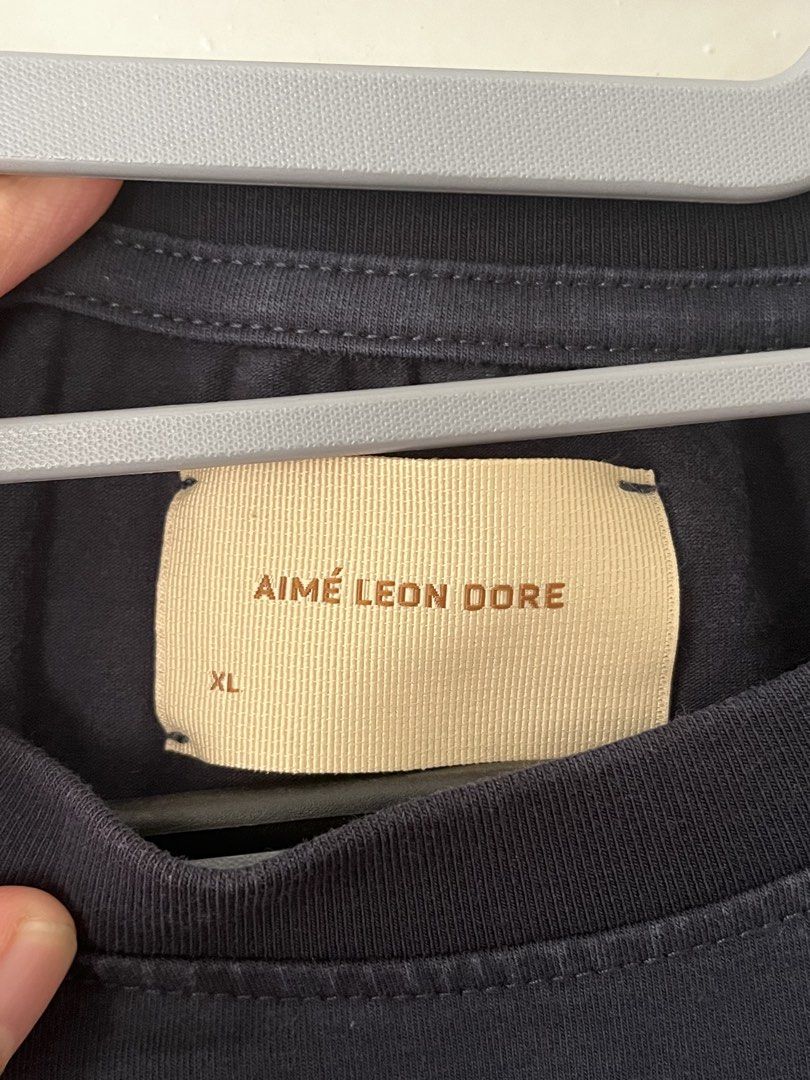 Aimé Leon Dore Graphic Shirt (Category: Tshirts & Polo Shirts ) located in Manila. Submitted by jojo_declutter (Listing ID 1452779352, Image 3). Description: - Aimé Leon Dore Graphic Shirt - Size XL on tag - Dimes: 21x27 - Color Rate: 10/10 - no issues! gcash payment only lalamove or j&t shipping qc loc dm for info!.