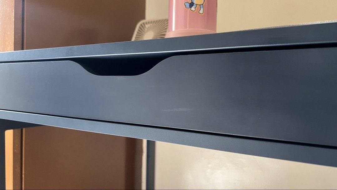Alex desk Dark Blue Desk with Two Drawers (Category: Tables & Sets) located in Paranaque City. Submitted by second_dance_ph (Listing ID 1452722052, Image 3). Description: - Dark blue desk - Two drawers with smooth gliding action - Built-in power outlet for convenience - Ideal for study or work spaces - Built-in cable management for collecting cables and cords out of sight but close at hand. Drawer stops prevent the drawers from being pulled out t