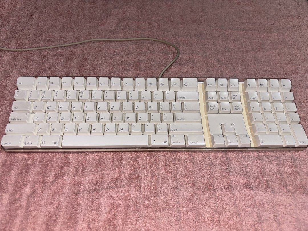 Apple Wired Keyboard A1048 (2003) (Category: Computer Keyboard) located in San Pedro. Submitted by luviestuff (Listing ID 1452737156, Image 1). Description: ‼️It was purchased in San Francisco, California. Keycaps, usb ports are responsive, everything works and is comfortable to press. Letters are clear. There are only scratches on acrylic base and dust on wire. Overall, keyboard is working fine. ‼️I can send a video of it being used. For sure bu