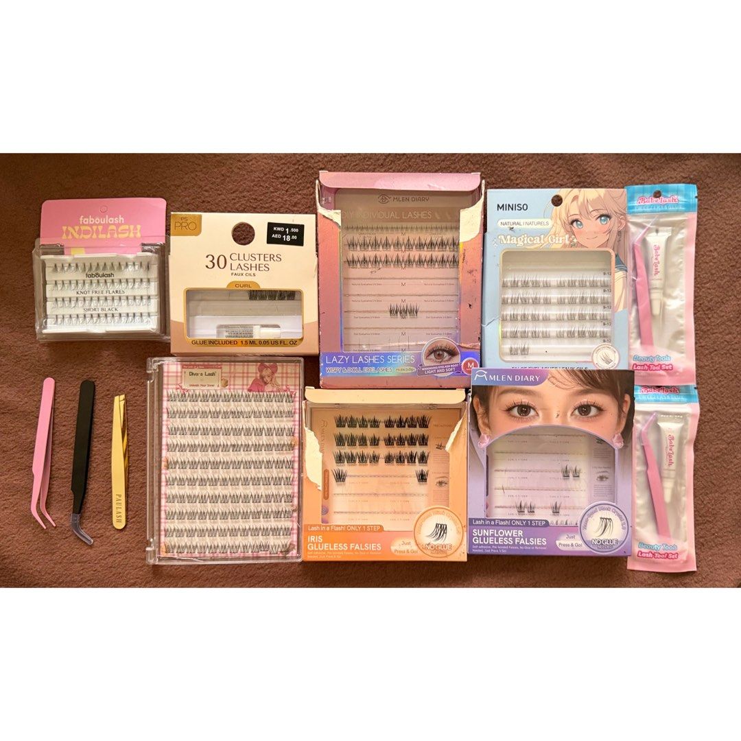 Assorted False Eyelashes & Tools - Faboulash, Mlen Diary, Miniso (Category: Makeup) located in Las Pinas. Submitted by zen.finds (Listing ID 1452726567, Image 1). Description: - Bundle includes: Faboulash Indilash, Mlen Diary individual lashes, Miniso Magical Girl lashes, Diva's Lash clusters. - Also includes Mlen Diary glueless falsies (Iris and Sunflower). - Comes with lash tweezers and glue. - Great variety for creating different lash looks. -