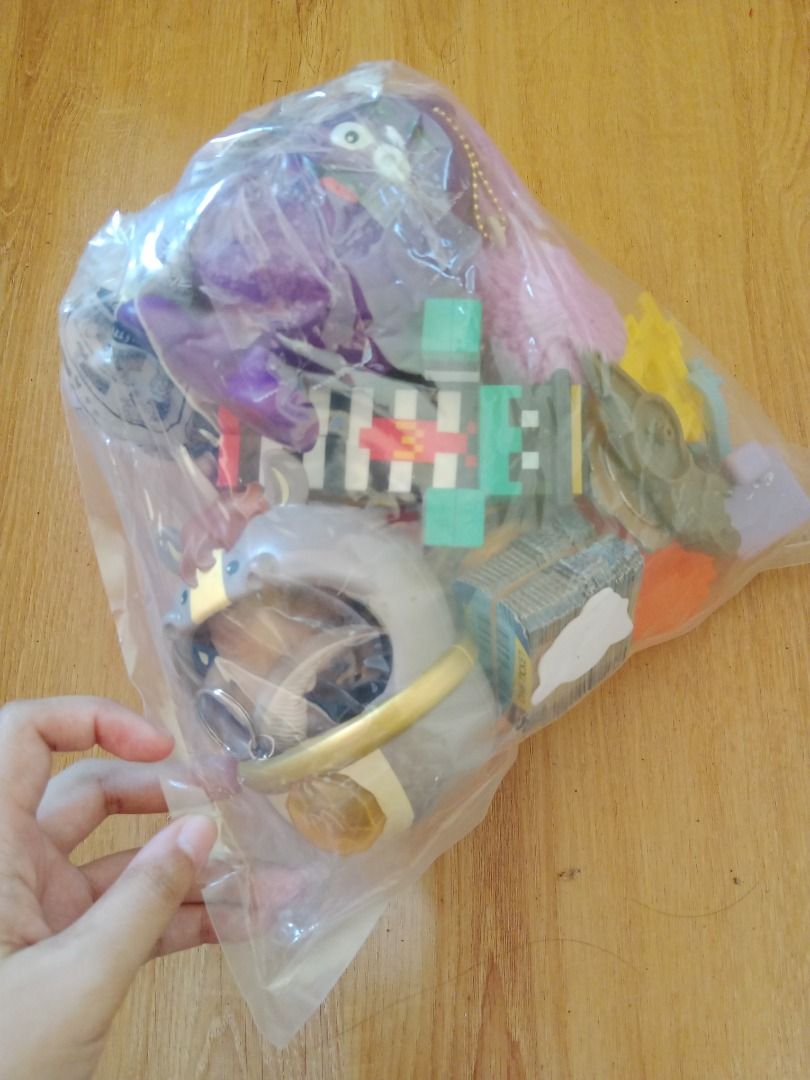 Assorted McDonald's Anik Anik toys Bundle (Category: Character Goods) located in Cavite. Submitted by sunsunplus (Listing ID 1452752806, Image 2). Description: - Assorted toy bundle perfect for kids or collectors. - Includes a variety of plush toys, small figurines, and building block style toys. - Some items still have their original tags attached. - Selling as a bundle, 'as is' condition..