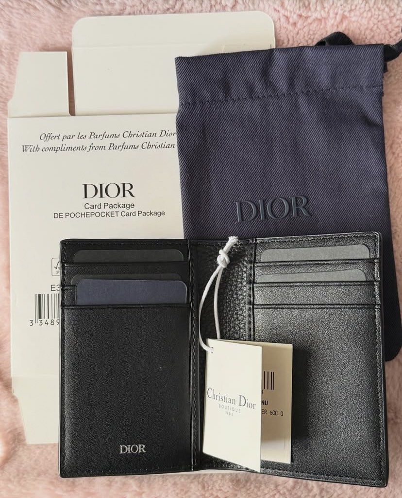 Authentic Dior Card Holder GWP (Category: Luxury Bags & Wallets) located in Makati City. Submitted by shopbymimi (Listing ID 1452558109, Image 3). Description: Authentic Dior card holder in black leather. Features the iconic Dior logo. Comes with dust bag and box. 📍Bel-air, Makati.