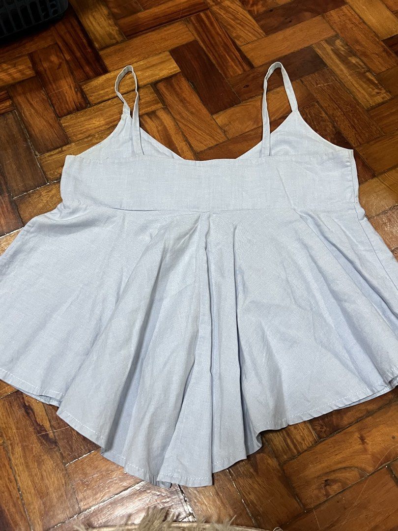 Baby blue ruffle peplum top (Category: Others Tops) located in Quezon City. Submitted by chloe_declutter (Listing ID 1452741411, Image 3). Description: Still available 07/26 Measurements posted in photo Location (Pickup/Delivery) Cubao QC, near Gateway mall Code: Teal Box.