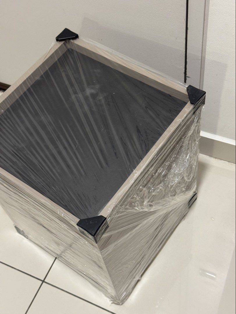 Bed side table (Category: Other Home Decor) located in Kuala Lumpur. Submitted by izzyizzaty7-30661 (Listing ID 1452859141, Image 2). Description: Dark grey bed side table. Buy 1 for RM 65 Buy 2 for RM 100.