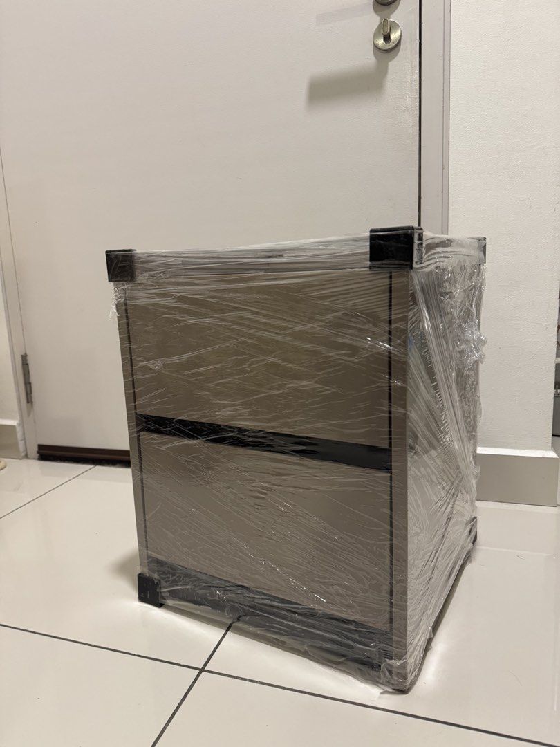 Bed side table (Category: Other Home Decor) located in Kuala Lumpur. Submitted by izzyizzaty7-30661 (Listing ID 1452859141, Image 1). Description: Dark grey bed side table. Buy 1 for RM 65 Buy 2 for RM 100.